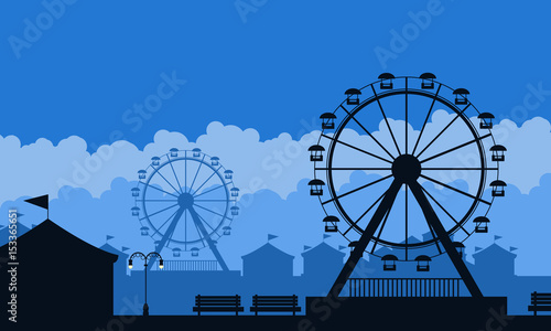 Silhouette of amusement park scenery background