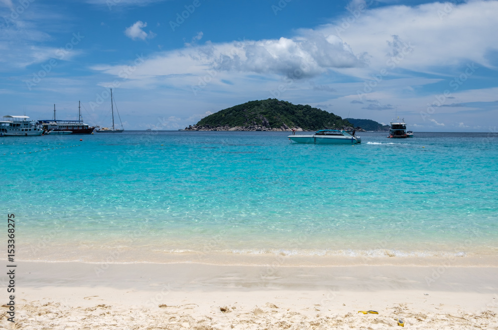 Beautiful clear sea with boat in similan Beautiful clear sea with boat in similan
