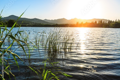 Lake and mountain scenery at sunset