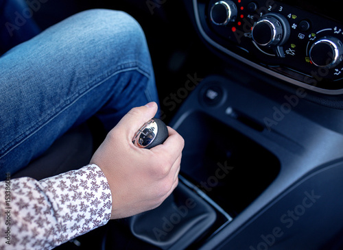 Man hand on the shift manual transmission