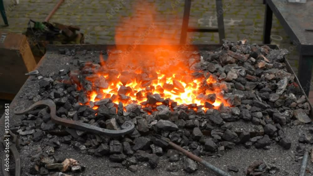 Blacksmith fire with hot metal Blacksmith fire with hot metal