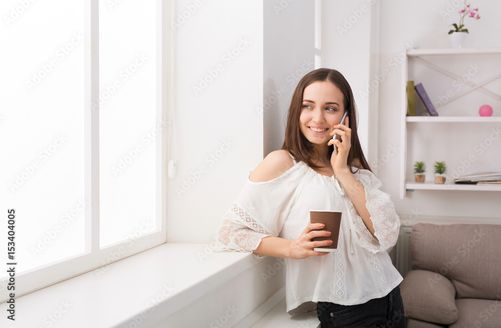 Happy woman talking on mobile phone Happy woman talking on mobile phone