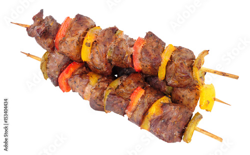 Grilled lamb meat and sweet pepper kebabs isolated on a white background