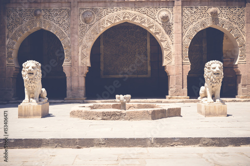 cairo, egypt, may 6, 2017: view of lion statue outside manial Palace photo