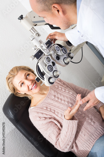 Checking eyesight in clinic.
