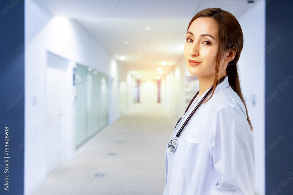 young female doctor in the lobby of the hospital young female doctor in the lobby of the hospital