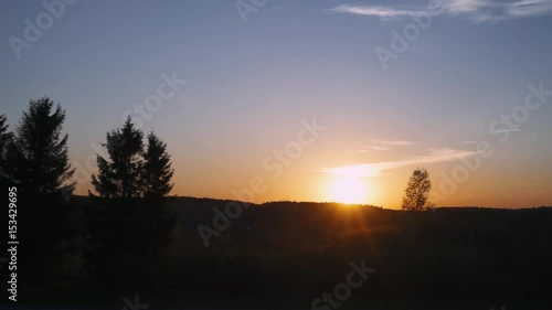 Wallpaper Mural Sunset, view on a forest from a window of a moving car. 
 Torontodigital.ca