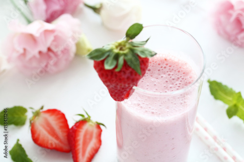 Delicious strawberry smoothie with fresh strawberry in a glass.Selective focus. いちごのスムージー