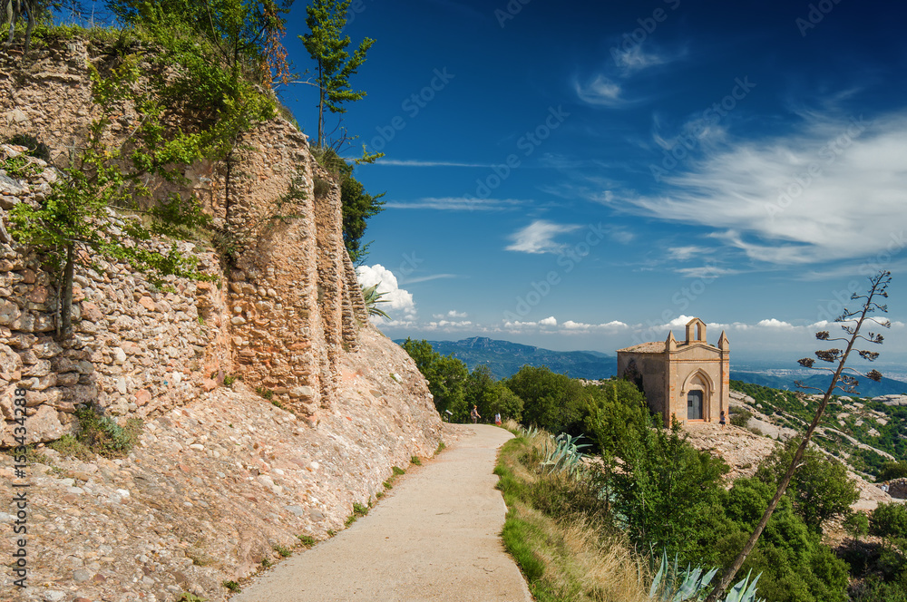 Sunny view of mountains of Santa Maria de Montserrat Abbey in Monistrol de Montserrat, Catalonia, Spain.