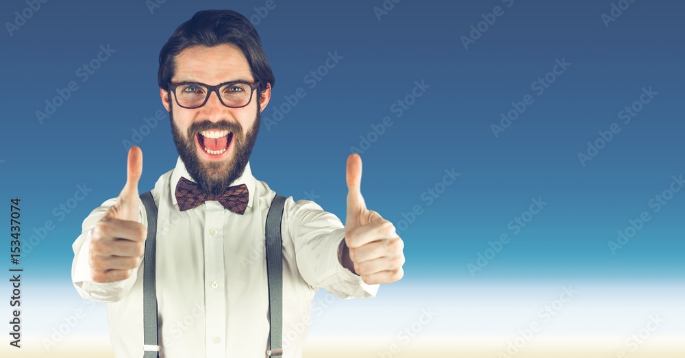 Hipster showing thumbs up against sky Hipster showing thumbs up against sky