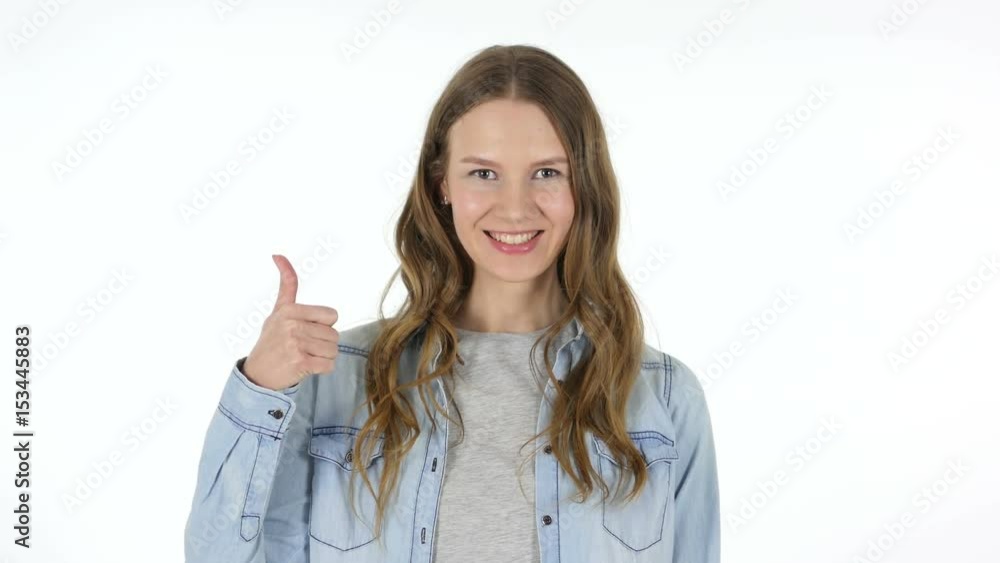 Thumbs Up by Beautiful Woman on White Background Thumbs Up by Beautiful Woman on White Background