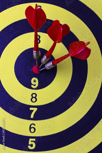 darts arrows in the target center  for background