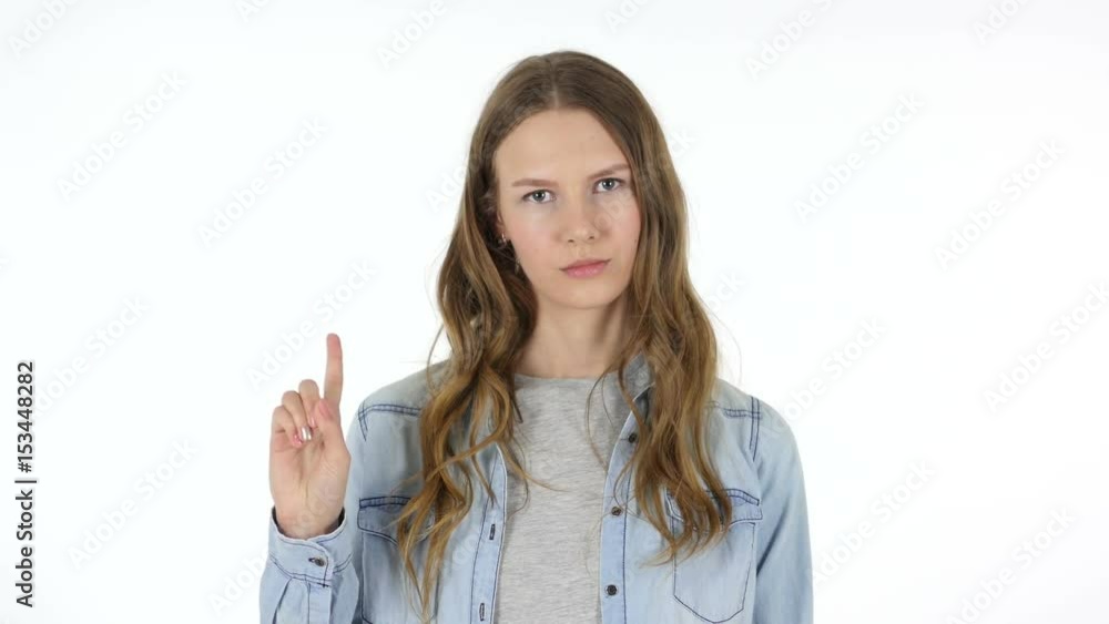 Rejecting, Waving Finger to Refuse, Woman on White Background Rejecting, Waving Finger to Refuse, Woman on White Background