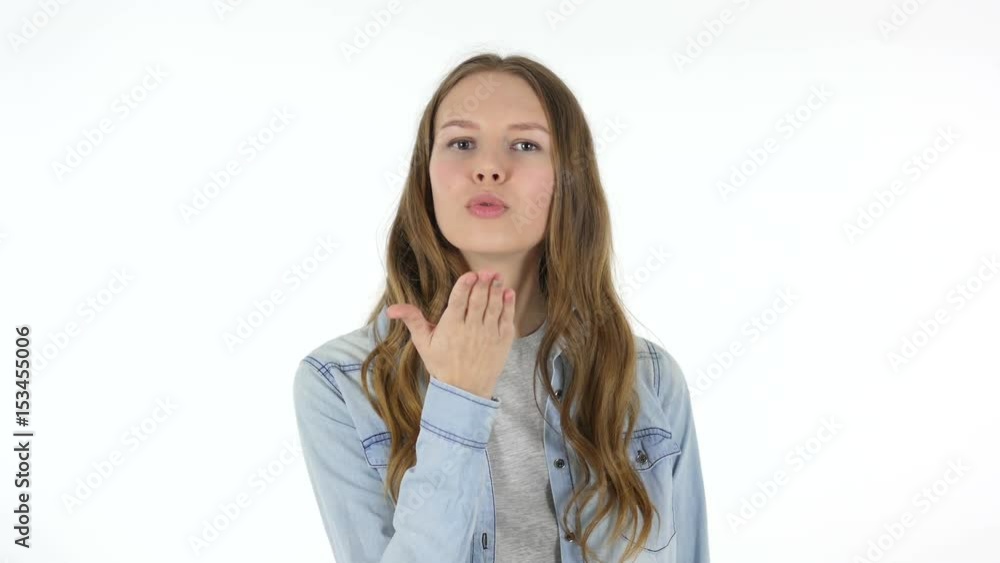Flying Kiss by Beautiful Woman on White Background Flying Kiss by Beautiful Woman on White Background