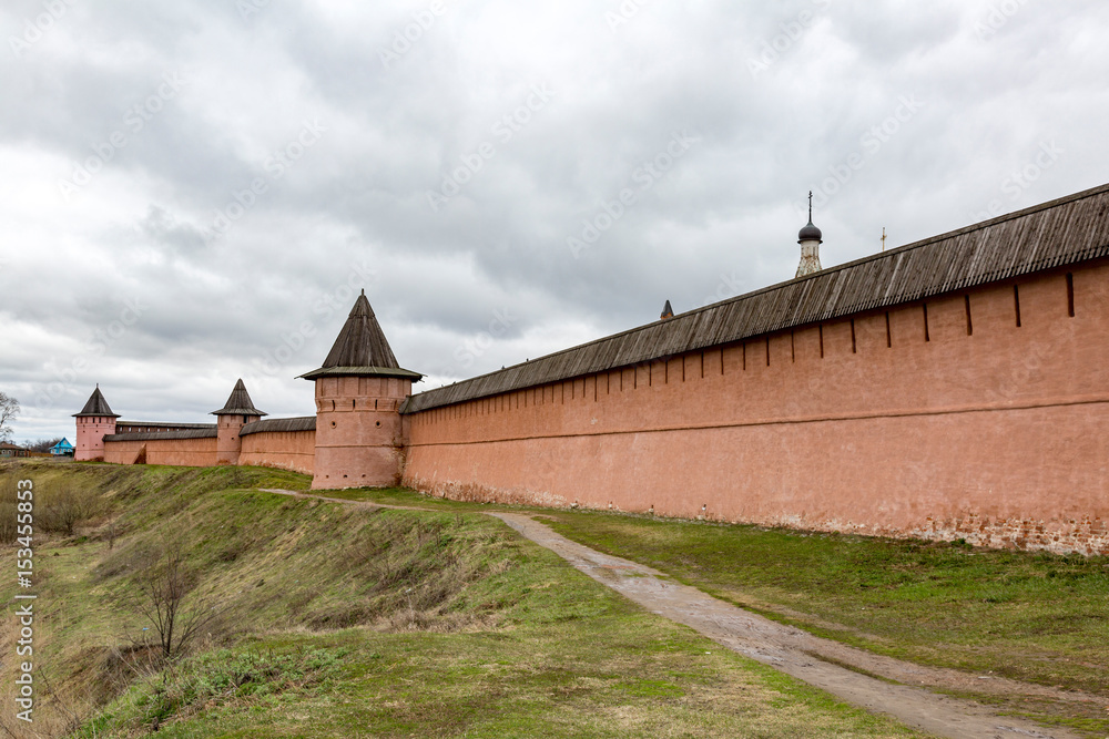 SUZDAL, RUSSIA - APRIL 28, 2017: Walls and towers of the Spaso-Evfimiy Monastery of the 17th century
