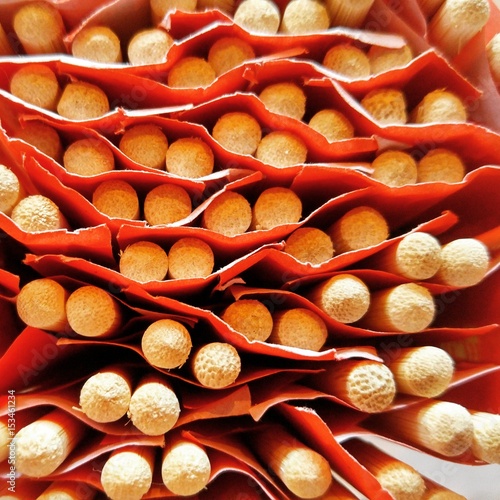 Chopsticks in a despenser in an Asian restaurant photo