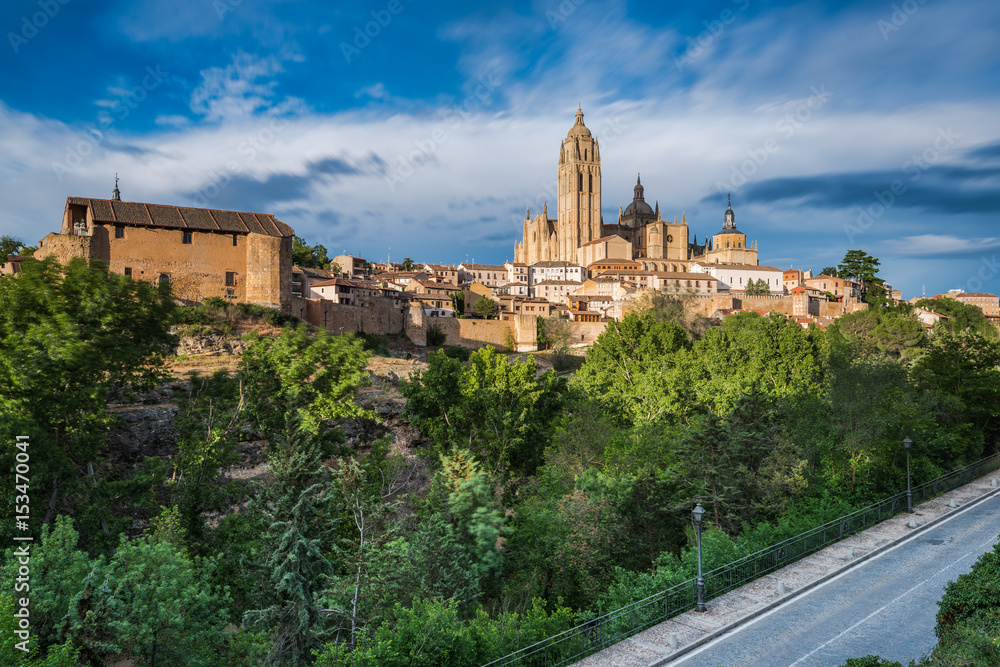 Fototapeta premium Cathedral in Segovia on hill top kissed with sun rays