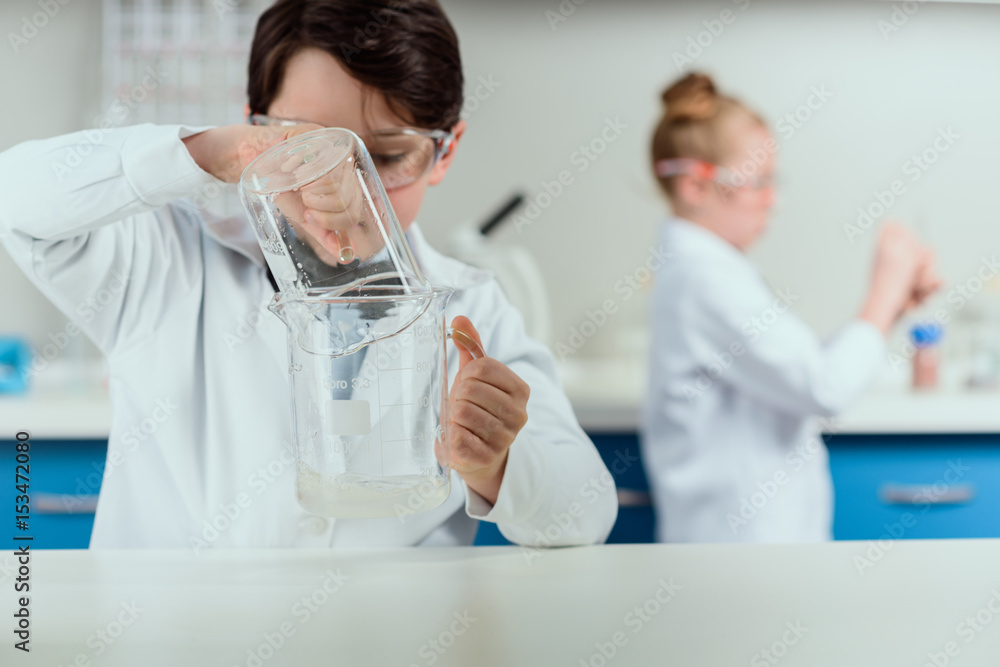 schoolchildren with science lab equipment in chemical lab, scientists kids group concept schoolchildren with science lab equipment in chemical lab, scientists kids group concept
