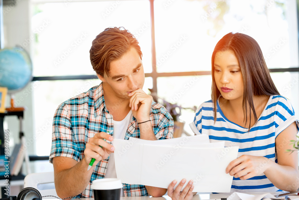 Fototapeta premium Two office workers at the desk