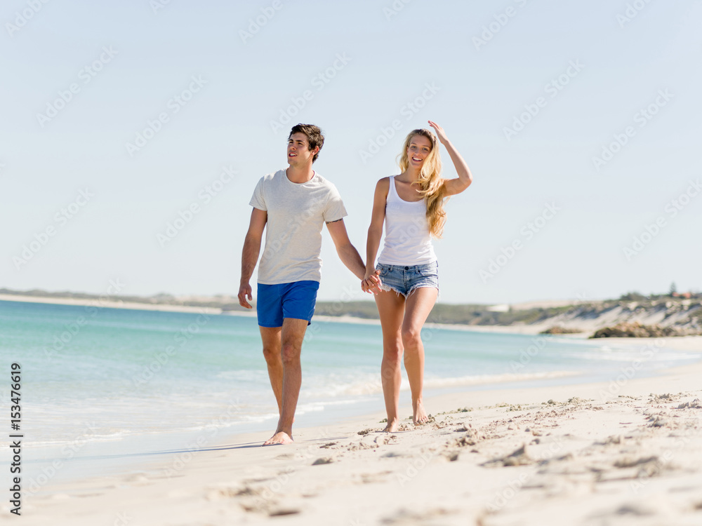 Romantic young couple on the beach