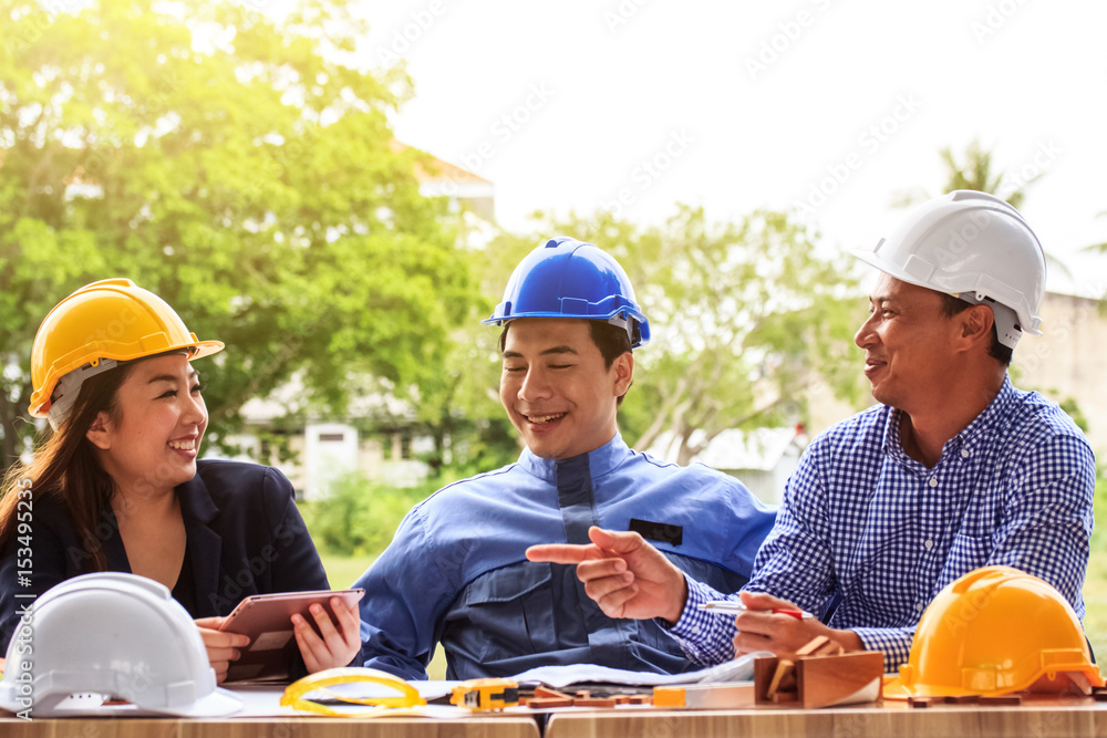 A group of architect discussing and talking fun a construction plan A group of architect discussing and talking fun a construction plan