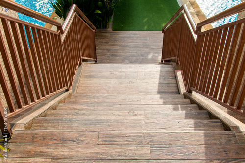 concrete stairs with steel banister