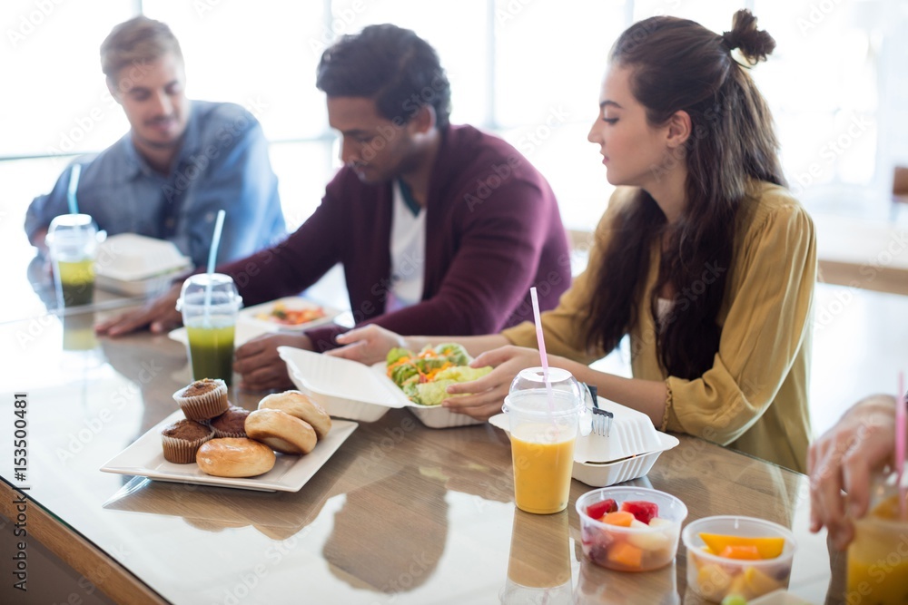 Creative business team having meal