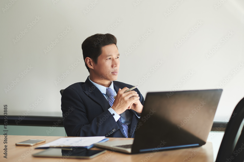 Contemplating businessman Contemplating businessman