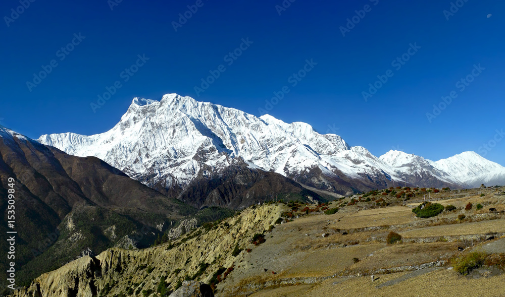 Majestic panoramic view of Annapurna and Gangapurna range. Annapurna Circuit Trek, Himalayan mountains, Nepal.
