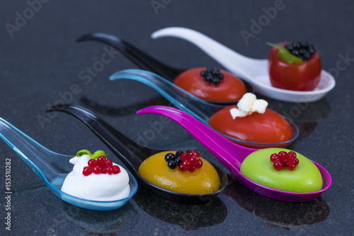Fototapeta Naklejka Na Ścianę i Meble -  Molecular cuisine dishes in plastic buffet tableware 
