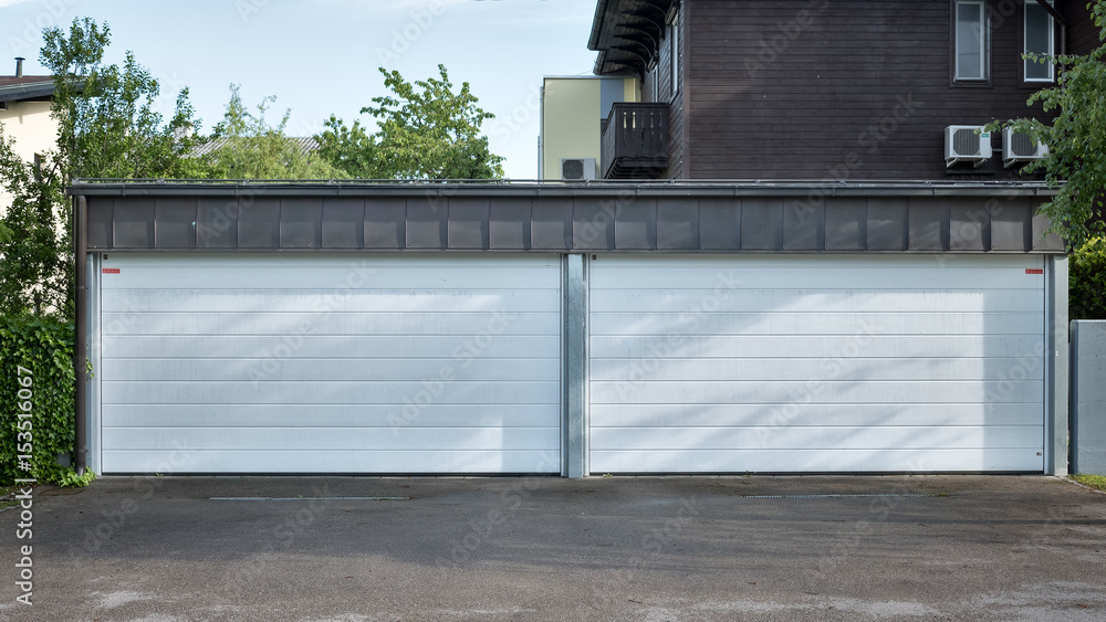 Obraz premium Modern garage door. Large automatic roll-up garage door. 
