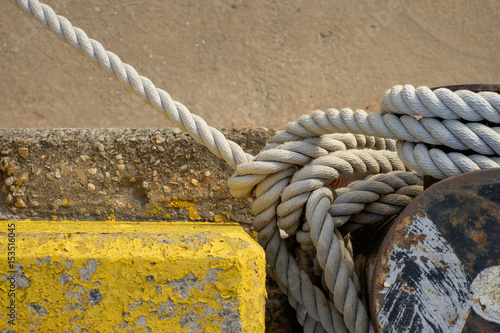 Boat rope on a concrete background © Maxim