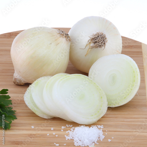 Fresh onion on the wooden board