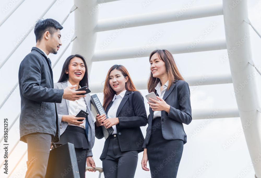Group of business people talking with mobile phone or tablet, Meeting Communication Discussion Working Concept Group of business people talking with mobile phone or tablet, Meeting Communication Discussion Working Concept