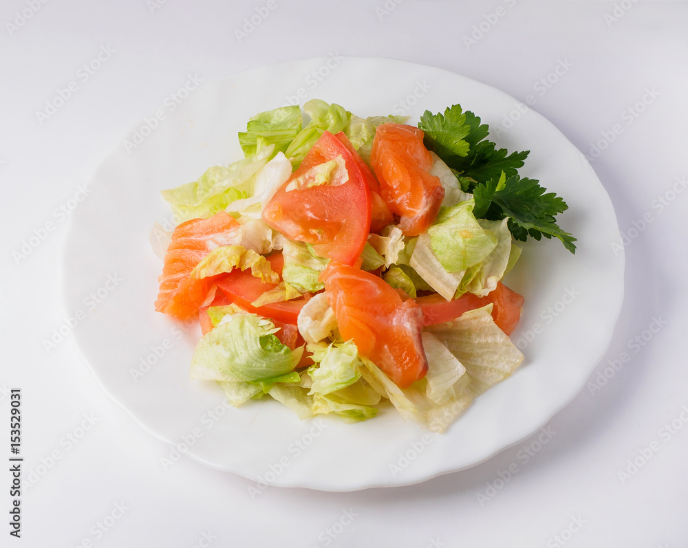 Salad with salmon fish. Isolated