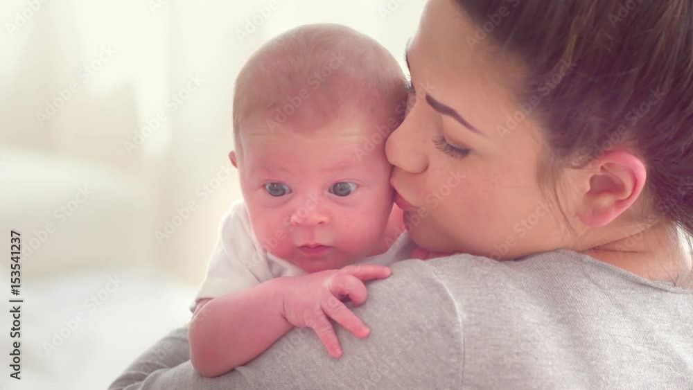 Happy mother and her newborn baby. Maternity concept. 3840X2160 4K UHD video Happy mother and her newborn baby. Maternity concept. 3840X2160 4K UHD video