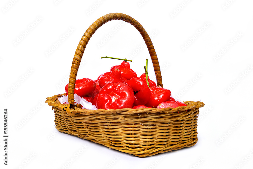 Rose apple, red fruit in the wicker basket, isolate on white background Rose apple, red fruit in the wicker basket, isolate on white background