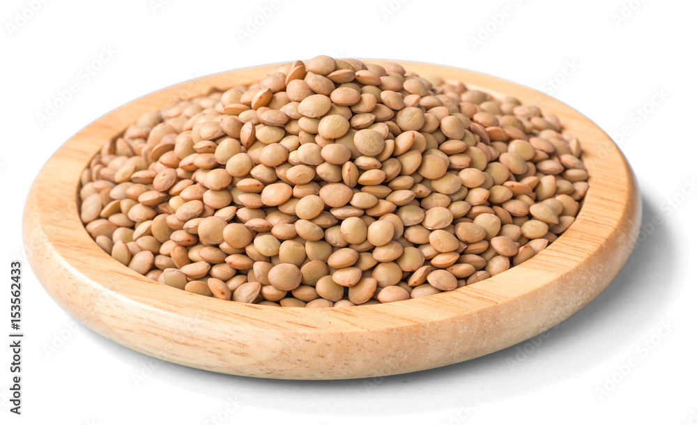 Fototapeta premium raw lentils on white, (large depth of field, taken with tilt shift lens)