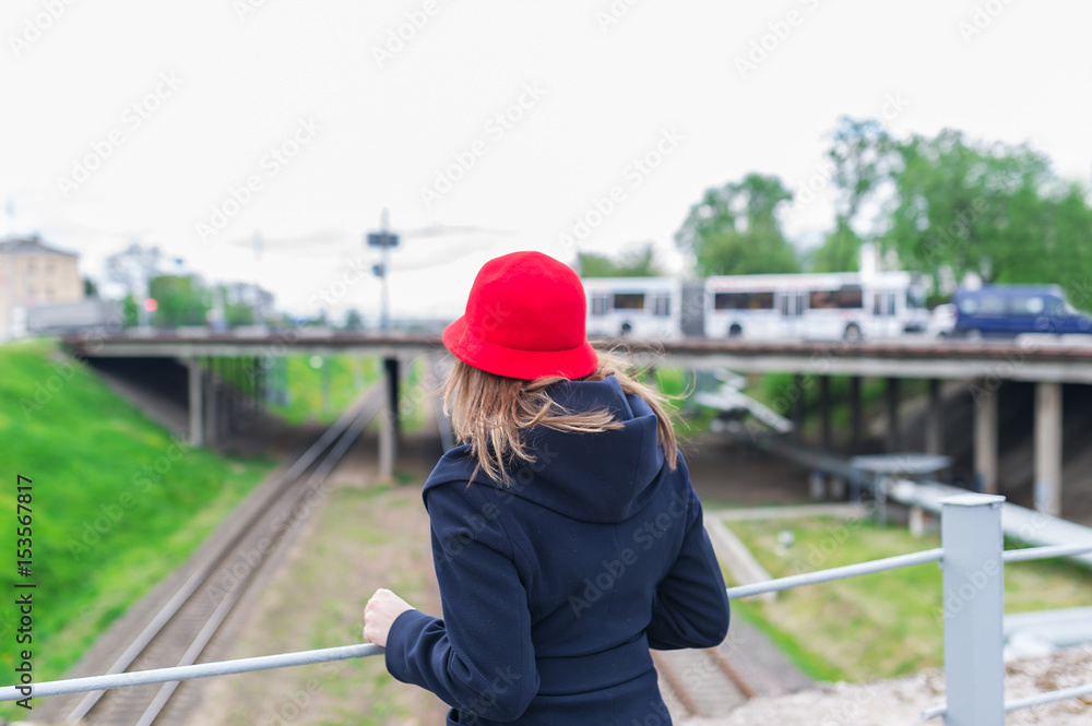 Young woman traveler in red cap. Travel concept, soft focus.