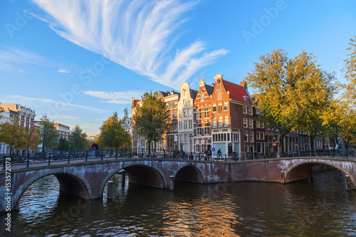 A view of the canal and facade of the traditional Dutch houses at Amsterdam, The Netherlands