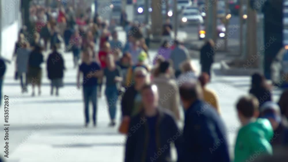 Anonymous crowd of people walking on street slow motion Anonymous crowd of people walking on street slow motion