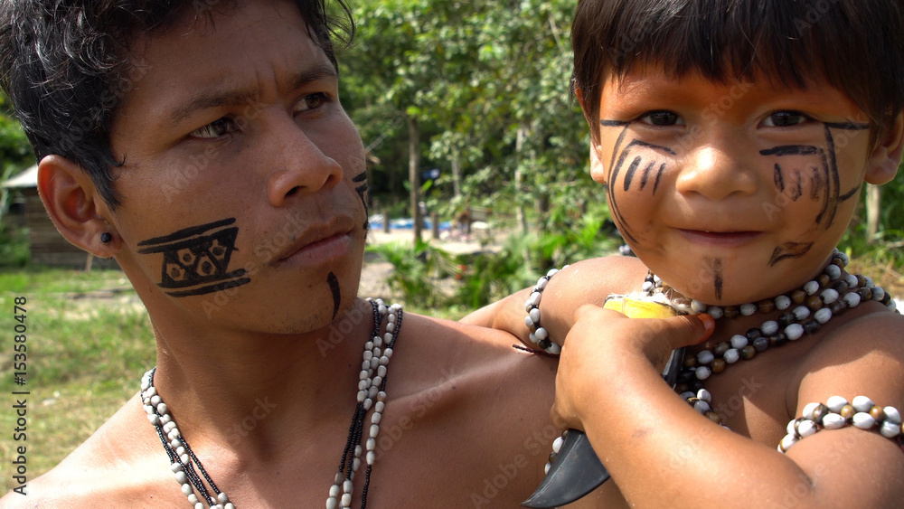 Father and Son at an indigenous tribe in the Amazon Stock Photo | Adobe ...