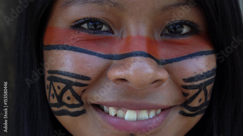 Native Brazilian Girl in a Tupi Guarani Tribe, Brazil photo