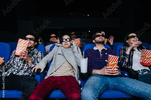 Group of friends having mixed feelings about a 3D horror movie