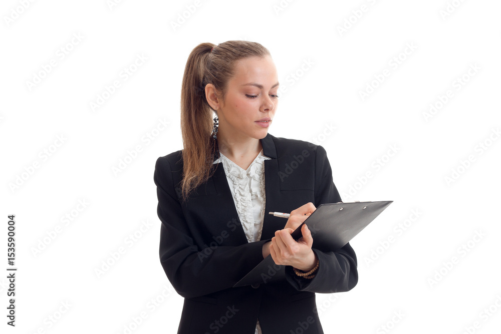 sexy serious blonde in an Office suit makes entries in the Tablet close-up sexy serious blonde in an Office suit makes entries in the Tablet close-up