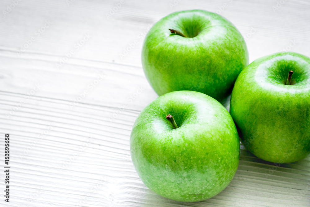 Healthy green food with apples on kitchen white background Healthy green food with apples on kitchen white background