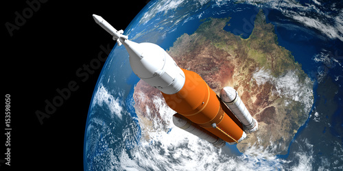 Fototapeta Naklejka Na Ścianę i Meble -  Extremely detailed and realistic high resolution 3d image of a Space Launch System Rocket. Shot from space. Elements of this image are furnished by Nasa.