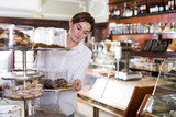 Woman choosing dessert