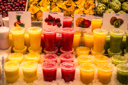 Colorful fruit juices in La Boqueria in Barcelona