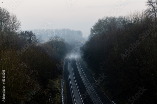 Railway in freezing fog photo